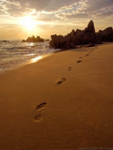 footprints-sand-beach-sunrise